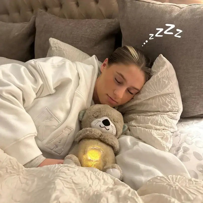 Peluche NutryCalm Nutria Dormilona Con Sonidos, Luces y Respiración